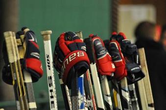 hockey gloves and sticks